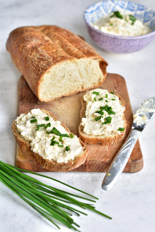 Smoked trout spread with eggs and cream cheese on a bread and in a bowl