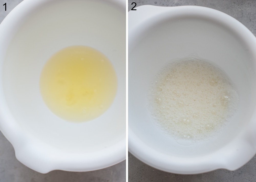 Egg whites in a white bowl. Frothy egg whites in a bowl.