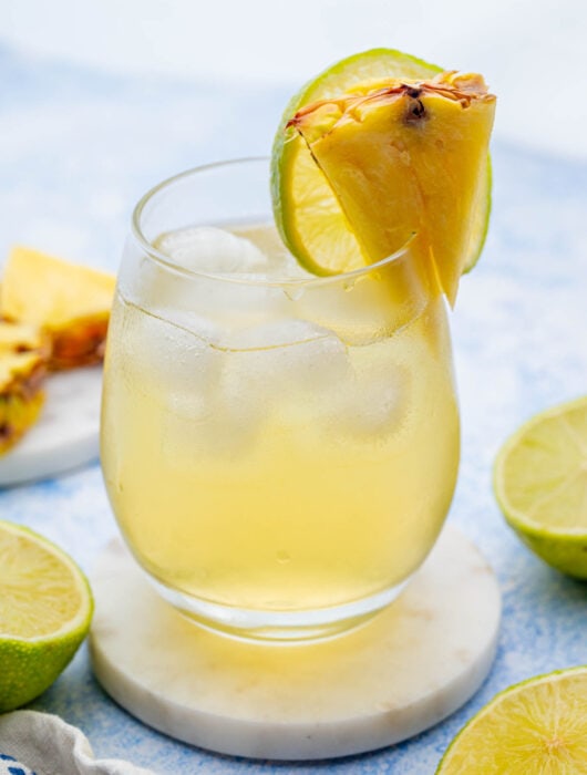 Pineapple vodka drink in a glass.