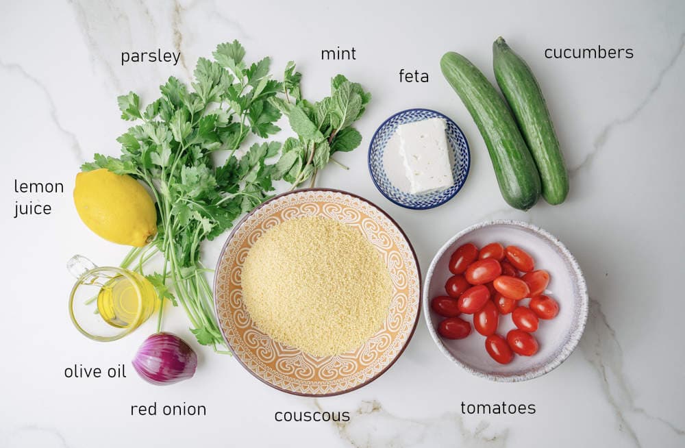 Labeled ingredients for couscous salad.